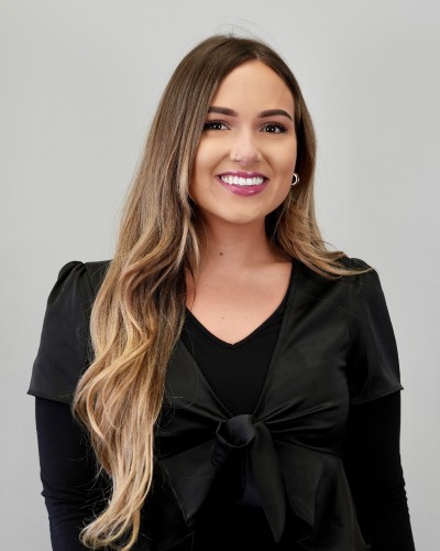 Smiling woman with long ombre hair