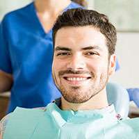 Man smiling in dental chair