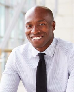 Smiling professional man wearing shirt and tie